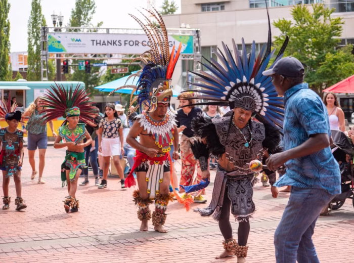 IXIC Aztec dancers with audience at Vancouver Arts and Music Festival