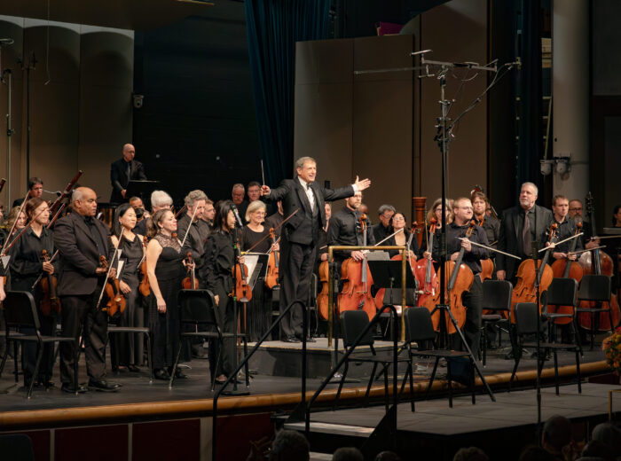 Vancouver Symphony Orchestra USA stands for applause after a performance.